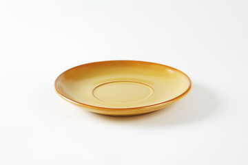 Light brown saucer