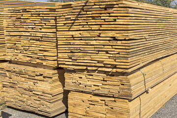 Wooden boards stacked in a pile