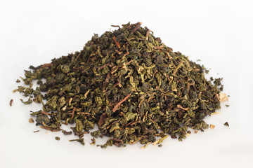 А bunch of green tea on white background