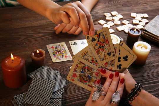 Witch - fortune teller reading fortune close up