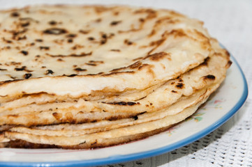 Fresh baked pancakes served on a plate