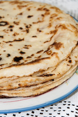 Fresh baked pancakes served on a plate