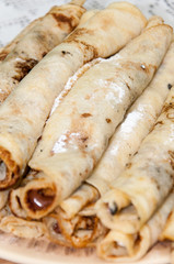 Pancakes with chocolate cream served on the plate