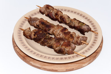 Grilled meat on a stick