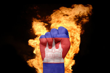 fire fist with the national flag of cambodia