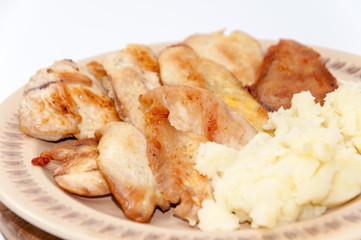 Grilled chicken breasts with mashed potato
