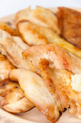 Pile of grilled chicken breasts