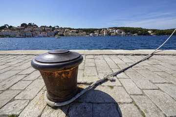 Naklejka premium Rusty bollard in Mali Losinj, Croatia