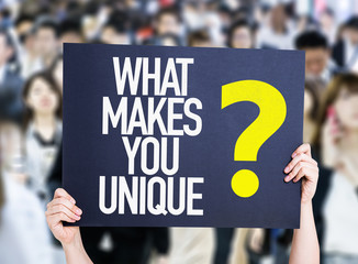 What Makes You Unique? placard oh crowd of people
