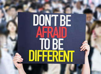 Don't Be Afraid To Be Different placard oh crowd of people
