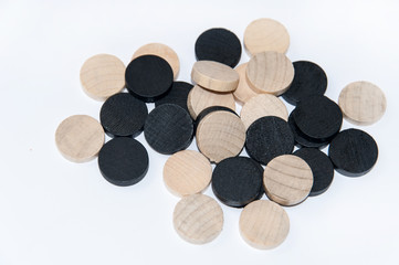 Obraz na płótnie Canvas Pile of wooden black and white chips