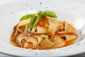 Pappardelle with tomato sauce and basil