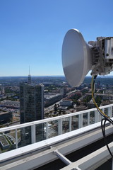 Bunch of transmitters and aerials on the skyscraper