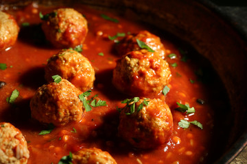 Pan with meat balls in tomato sauce, close-up