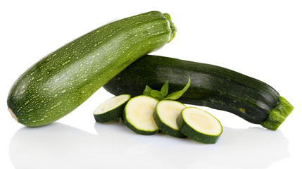 Fresh zucchini with basil isolated on white