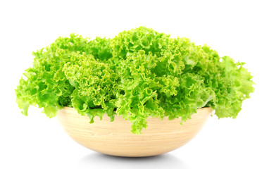 Fototapeta premium Green fresh lettuce in bowl isolated on white