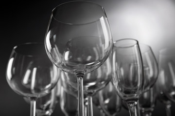 Empty wine glasses on gray background
