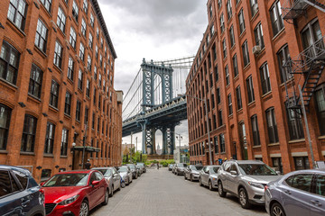 New York City Manhattan Bridge and brick wall building