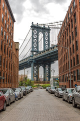 New York City Manhattan Bridge and brick wall building