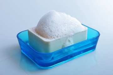 Soap with foam isolated on white