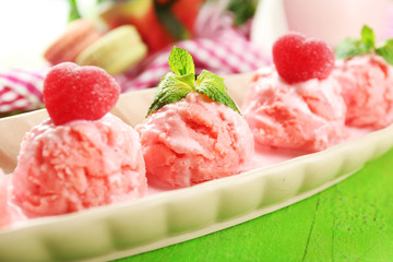 Watermelon ice cream in bowl  on color wooden background