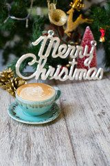 Hot Coffee cup on vintage table /Christmas holidays background