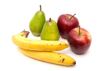 Pitcher of juice. Pears, apples and bananas. On a white backgrou