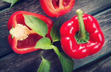 Fresh red pepper on wooden background