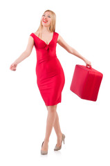 Blondie in red dress with suitcase isolated on white