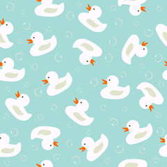 Vector seamless pattern with white ducks and bubbles on blue water. Perfect for background of greeting cards, invitations, baby shower, fabric, scrapbook, baby album.