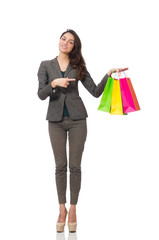 Attractive woman with shopping bags isolated on white