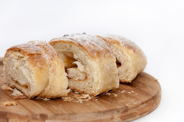 Puff pastry sliced on the wooden board