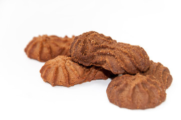 Brown chocolate cookies over white background