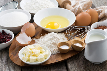 fresh ingredients for baking on a wooden board, horizontal