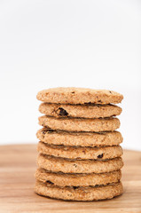 Pile of integral biscuits on a wooden board