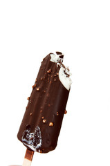 Chocolate ice cream over white background