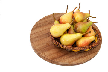 Fresh pears in the wooden basket