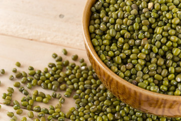 green beans on wood background