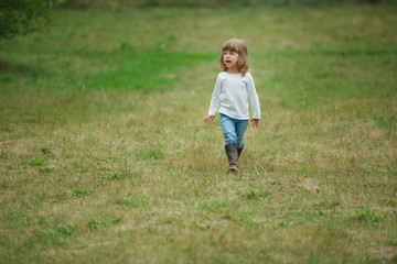 cute alone little girl in park
