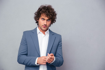 Confident businessman looking at camera