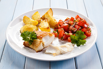Fish dish - fried fish fillet and vegetables