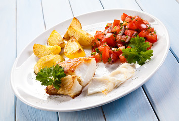 Fish dish - fried fish fillet and vegetables