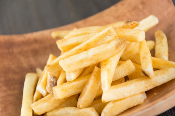 french fries on wood background