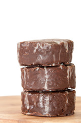 Pile of chocolate muffins on the wooden board