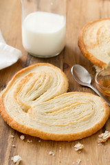 palmier on plate on brown wooden background