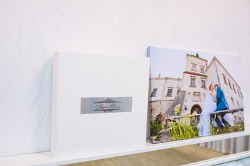 Obraz premium white leather wedding photobook and album with picture