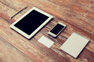 Fototapeta premium close up of notebook, tablet pc and smartphone