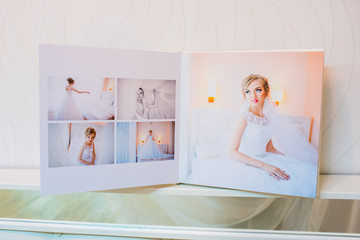 Fototapeta na wymiar Classic white leather wedding photobook and album