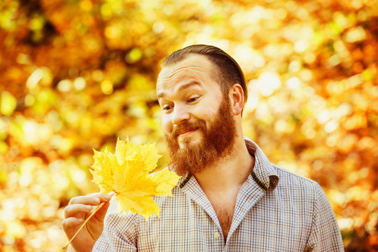 Portrait Of Funny Man In Shirt With Red Hair And Beard 