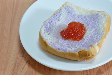 slice bread mixed with taro topping fruit jam